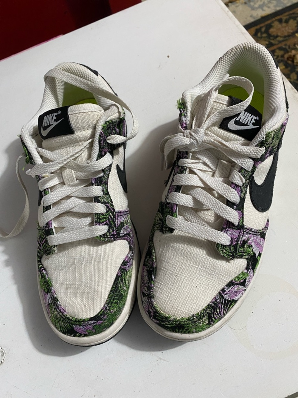 Nike Women’s White Sneakers with Green & Purple Floral Accents